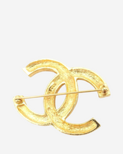 Broche Chanel CC